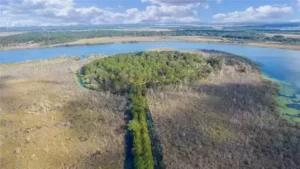 Aerial view of Big Pine Island surrounded by lakes and Florida wetlands